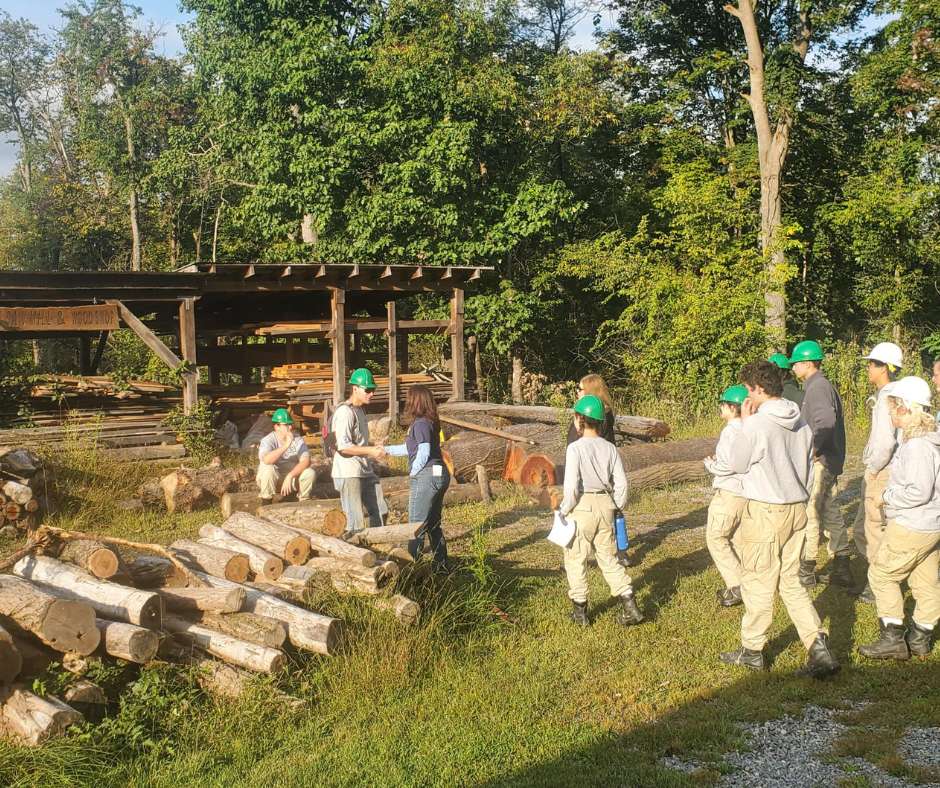 A group of people in white hats and uniforms.