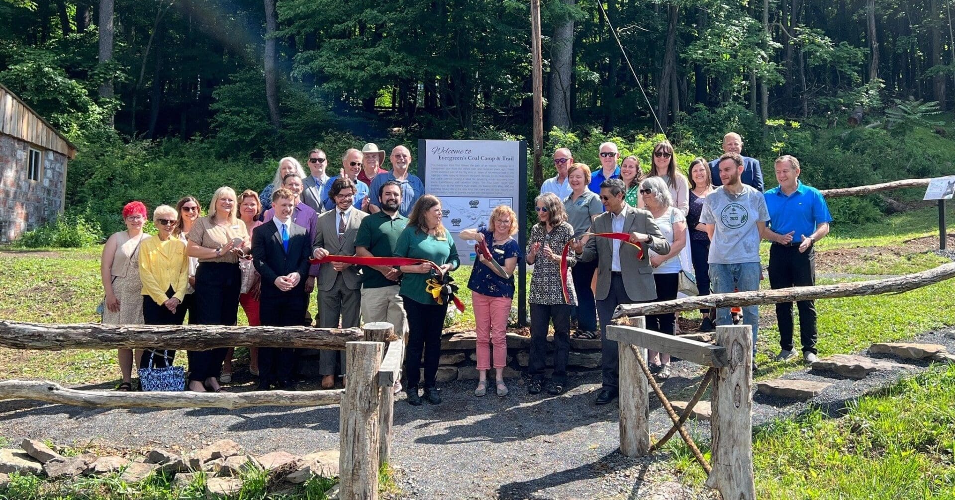 Ribbon cutting ceremony at Evergreen's Coal Camp & Trail.